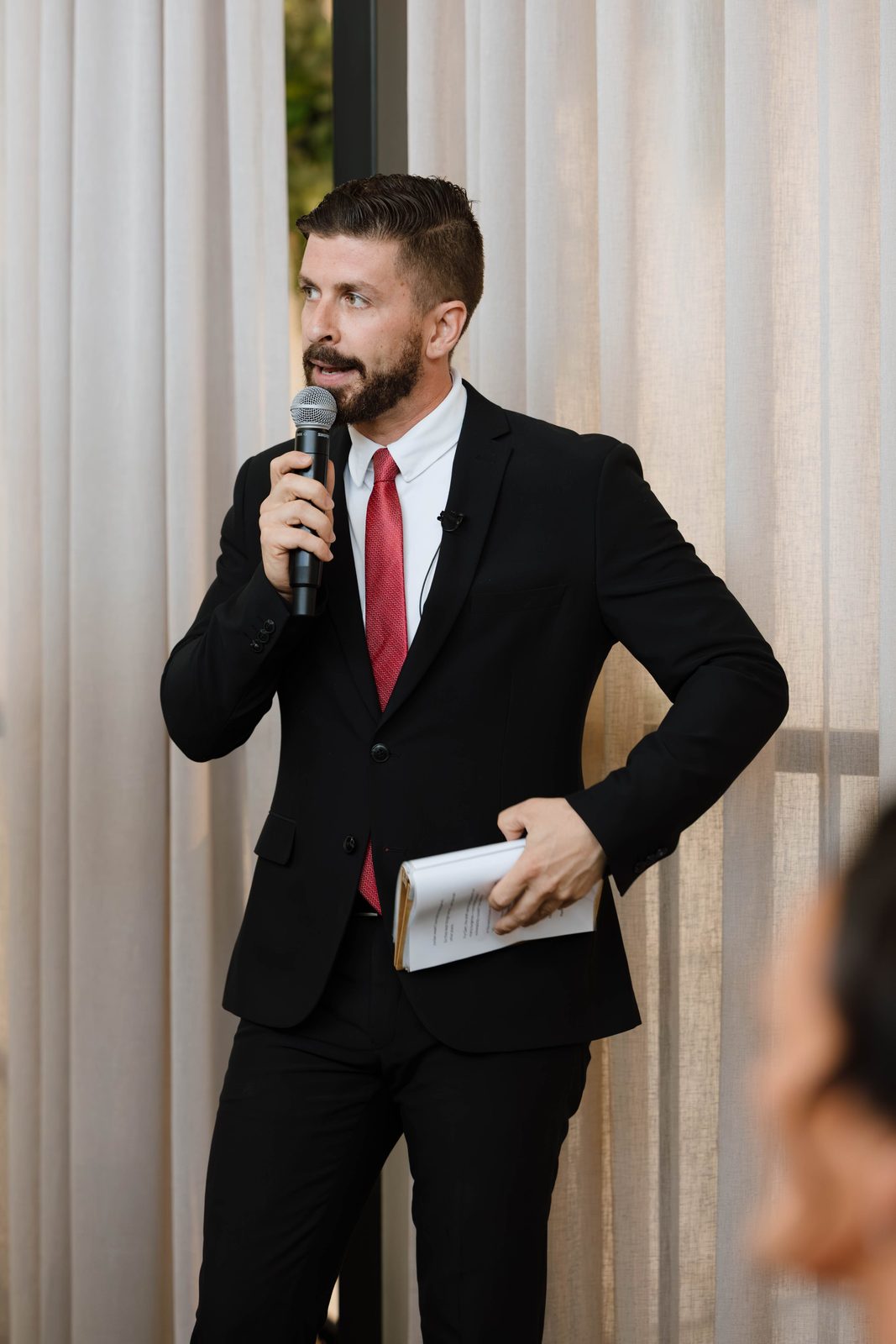 John Edney corporate MC on the mic at a Melbourne event